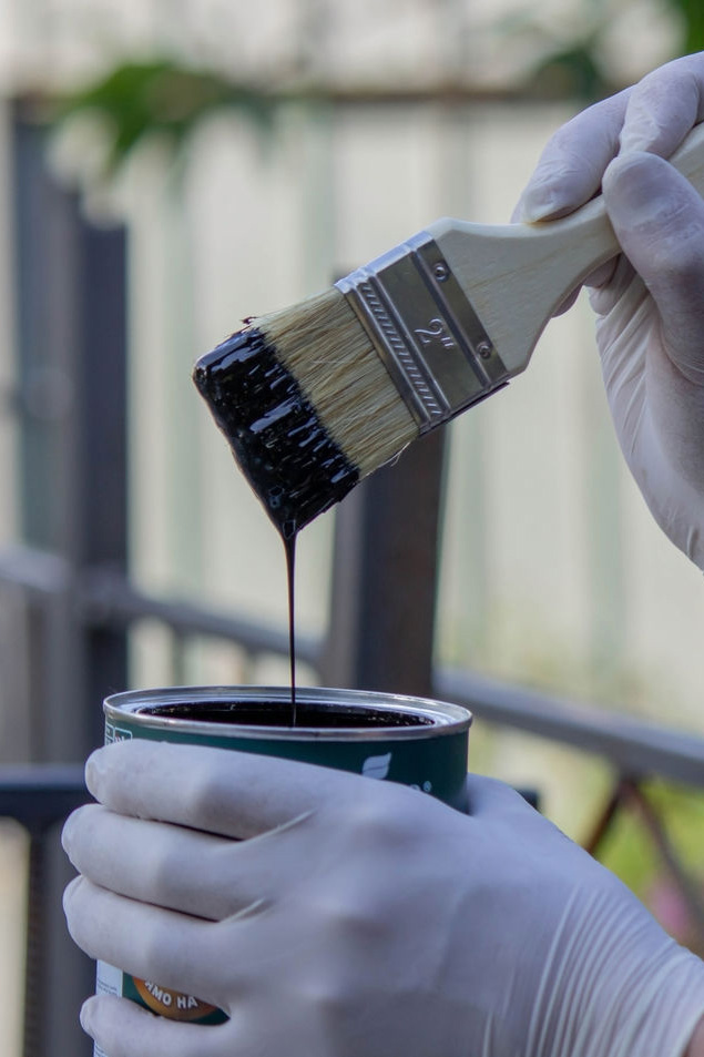 close-up-of-a-hand-painting-a-metal-pipe-selectiv-2025-03-15-14-18-18-utc_result