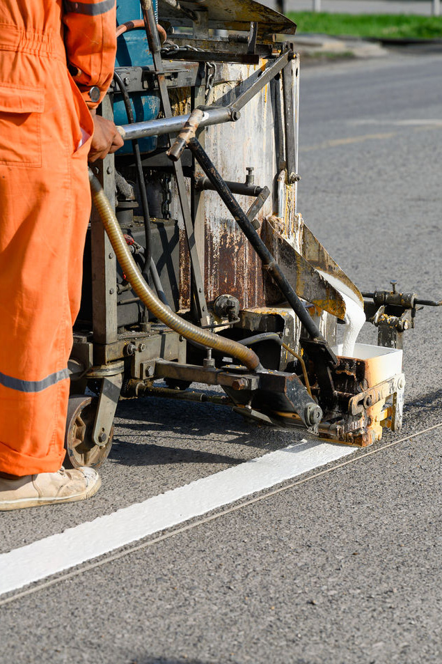 worker-wearing-uniform-is-making-the-white-line-on-2025-03-25-02-08-06-utc_result